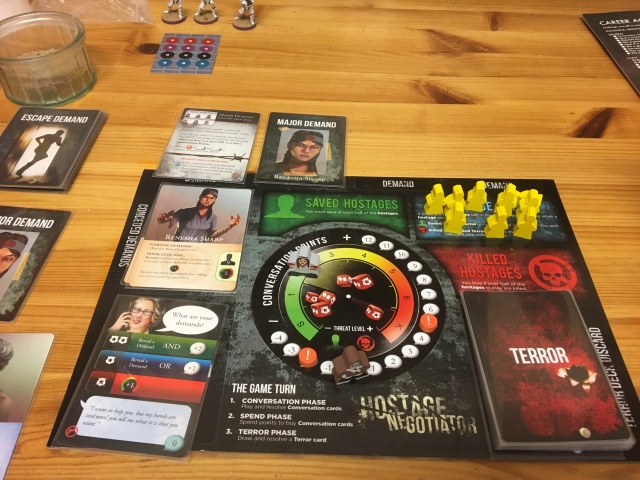 The board and cards set up for the game.